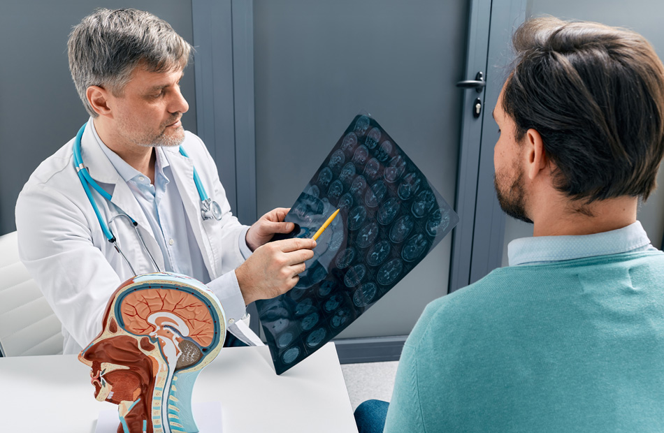 Neurologist reviewing brain scan results