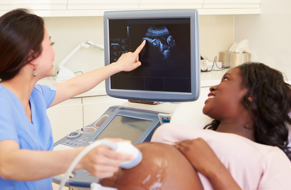 Prenatal ultrasound examination with expectant patient